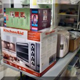 K32. Nostalgia Electrics air popper and KitchenAid countertop convection oven.